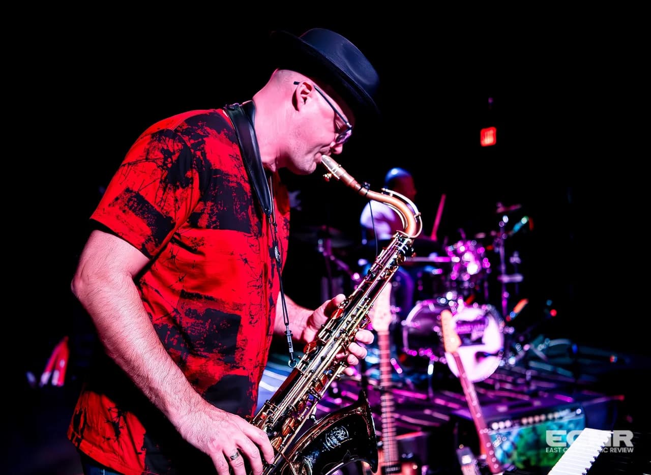 Jeffrey Saunders, red-lit sax close-up
